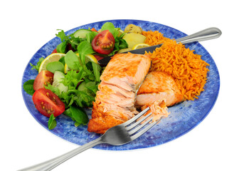 Grilled salmon fish fillets with chilli flavoured rice and salad meal isolated on a white background