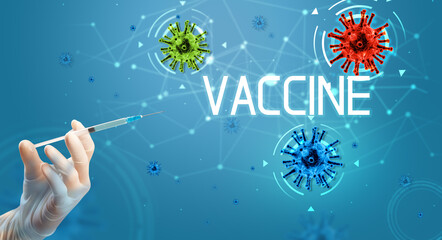 Syringe, medical injection in hand with VACCINE inscription, coronavirus vaccine concept