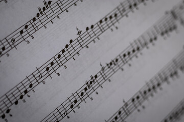Fototapeta premium close up of sheet music digitally printed on paper