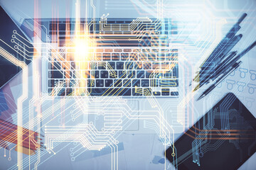 Double exposure of map hologram drawing over study table background with computer. Concept of international network. Top view.