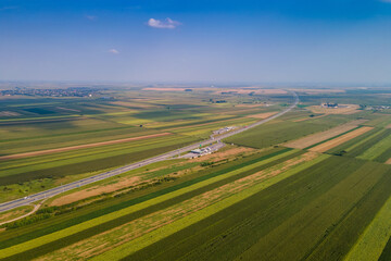 agriculture field from aerial view in serbia near highway