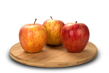 Fresh apples selected under wooden board.