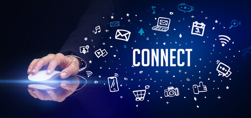 hand holding wireless peripheral with CONNECT inscription, social media concept