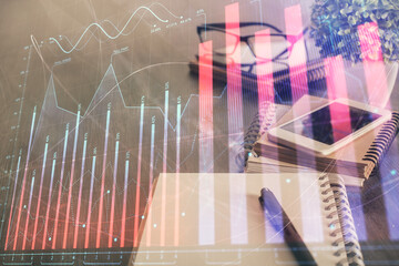 Double exposure of forex chart drawing and cell phone background. Concept of financial trading