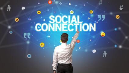 Rear view of a businessman with SOCIAL CONNECTION inscription, social networking concept