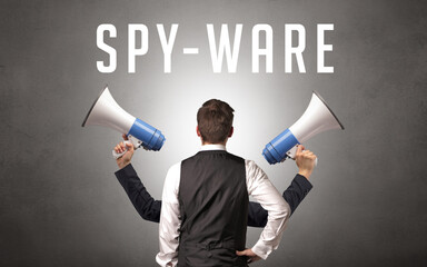 Rear view of a businessman with SPY-WARE inscription, cyber security concept
