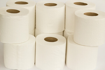 Clean toilet paper roll heap on white background.Close up taken