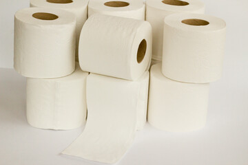 Clean toilet paper roll heap on white background.Close up taken