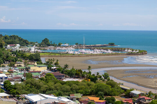 Quepos, Costa Rica. Vista desde mirador en el centro de Quepos, al fonfo la Marina Pez Vela y dem&aacute;s edificaciones del cant&oacute;n.