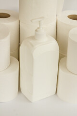 Clean toilet paper in stack on white with disinfectant.Close up taken