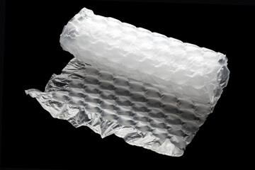 nflatable air buffer plastic bag on black background. protective packages.