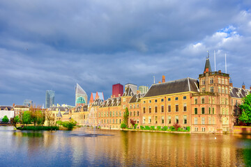 Binnenhof Palace of Parliament inThe Hague in The Netherlands At Daytime. Against Modern Skyscrapers on Background.