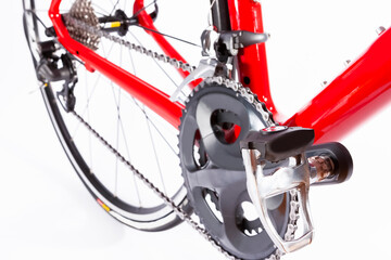 Obraz premium Cycling Ideas. Crankset and Rear Cassette with New Chain. Against White.