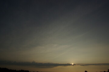 The sun in the clouds.