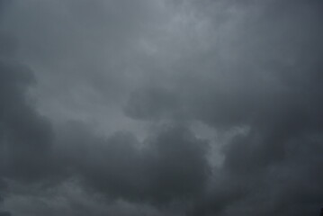 Dark clouds in an alarming sky.