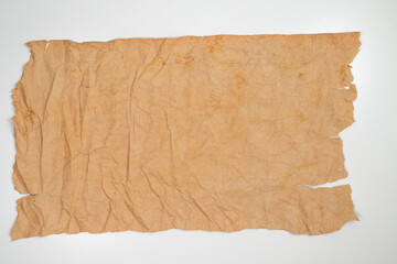 Old grunge paper texture.The texture of the paper is wet, old, yellowed with time. Torn, stained.