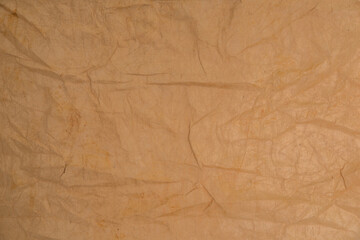 Old grunge paper texture.The texture of the paper is wet, old, yellowed with time. Torn, stained.