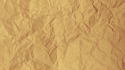Brown crumpled paper texture. Wrinkled Paper background. Old pale yellow crumpled paper background texture.
