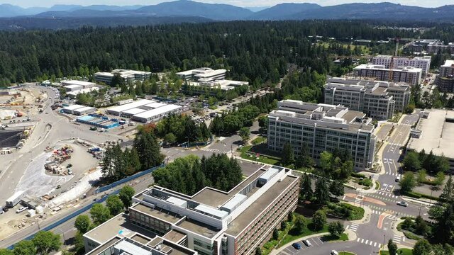 Aerial. drone footage of various residential and commercial construction sites in Redmond, Washington near the Microsoft corporate headquarters