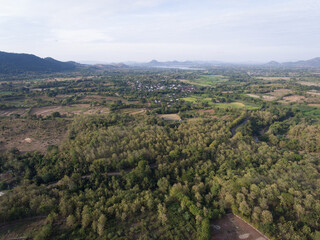 Fototapeta na wymiar Aerial view of forest and empty land before the planting season in Sumbawa, Indonesia
