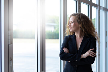 Elegant business caucasian woman at modern office building