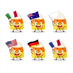 Candy corn cartoon character bring the flags of various countries