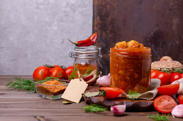 Canned cauliflower with vegetables in tomato sauce