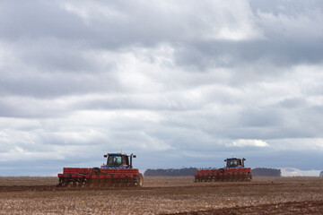 plowing machine harvesting on a sunny day