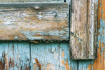 Old rustic wooden window in countryside house. Selective focus. Abstract background. 