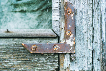 Old rustic wooden window in countryside house. Selective focus. Abstract background. 