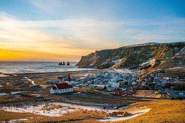 Vik, a small town at the south coast in Iceland, in winter time, at sunset. © Zimu