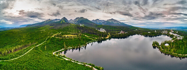 Panoramic view of mountain lake in National Park High Tatra. Strbske pleso, Slovakia, Europe. Beautiful world.