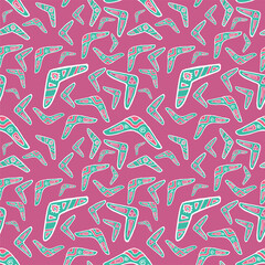 Seamless pattern vector of pastel tribal style motif boomerang on pastel pink background