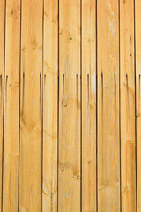Background. Fragment of a wooden fence close-up.