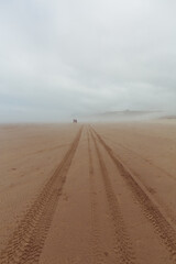 Beautiful misty ocean shore at Cannon Beach, Oregon