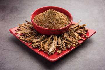 Dry mango powder is an indian spice amchoor with raw dried fruit