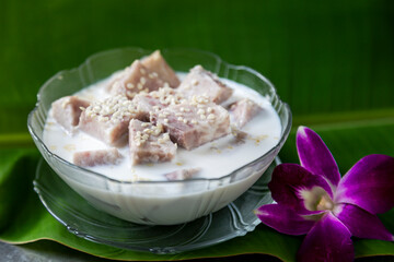 
Boiled taro in coconut milk, coconut in a bowl of Thai snacks