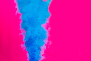 Smoke Bomb with blue smoke on rose background. Backgrounds and textures.