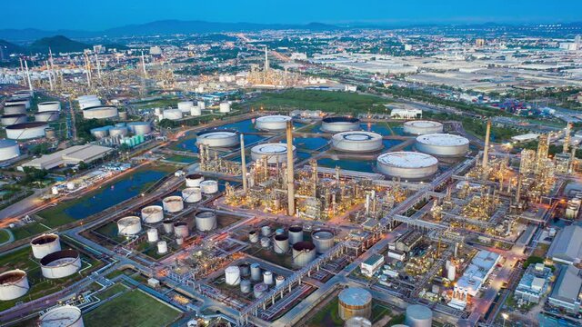 Aerial view hyperlapse 4k video of oil refinery terminal is industrial facility for storage of oil and petrochemical. oil manufacturing products. power electric plant. hyper lapse