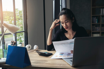 Budget and Tax planning concept, Accountant is calculating company annual tax. Calendar 2019 and...