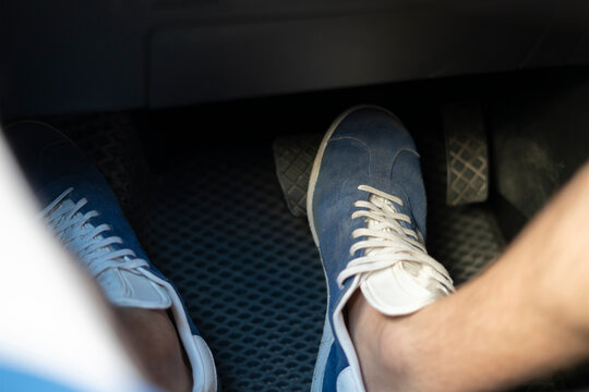 Male Driver Feet Push He Pedals Inside The Car Cockpit