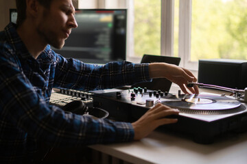 listen to the music on vintage record player at home, relax and chill