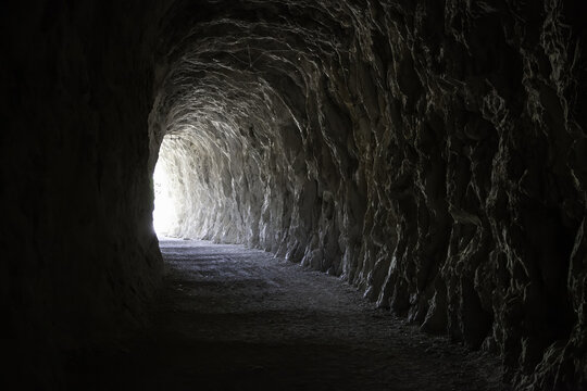 Fototapeta Deep stone tunnel