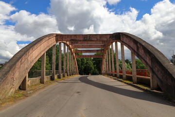 Old arched reinforced concrete road bridge. Sovetsk, Kaliningrad region