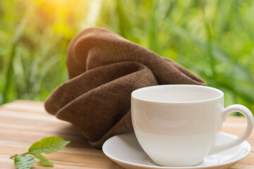 Close up cleaning coffee cup on the morning with microfiber cloth,Close up woman hand cleaning coffee cup on the 