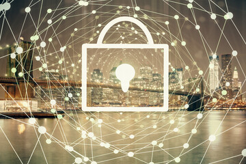 Lock icon hologram on city view with skyscrapers background multi exposure. Data security concept.