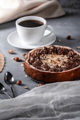 Homemade pie with nuts and chocolate ganache