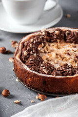 Homemade pie with nuts and chocolate ganache