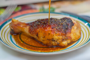 Baked chicken dish with honey and herbs.