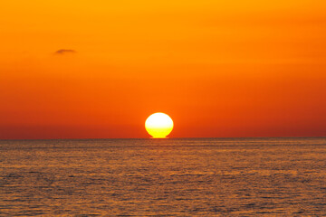 Cetraro, Italy - July 9, 2017: The sun sets over the sea